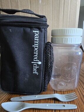 Pampered Chef Black Lunch Tote with White Jar Lid and Gray Utensils
